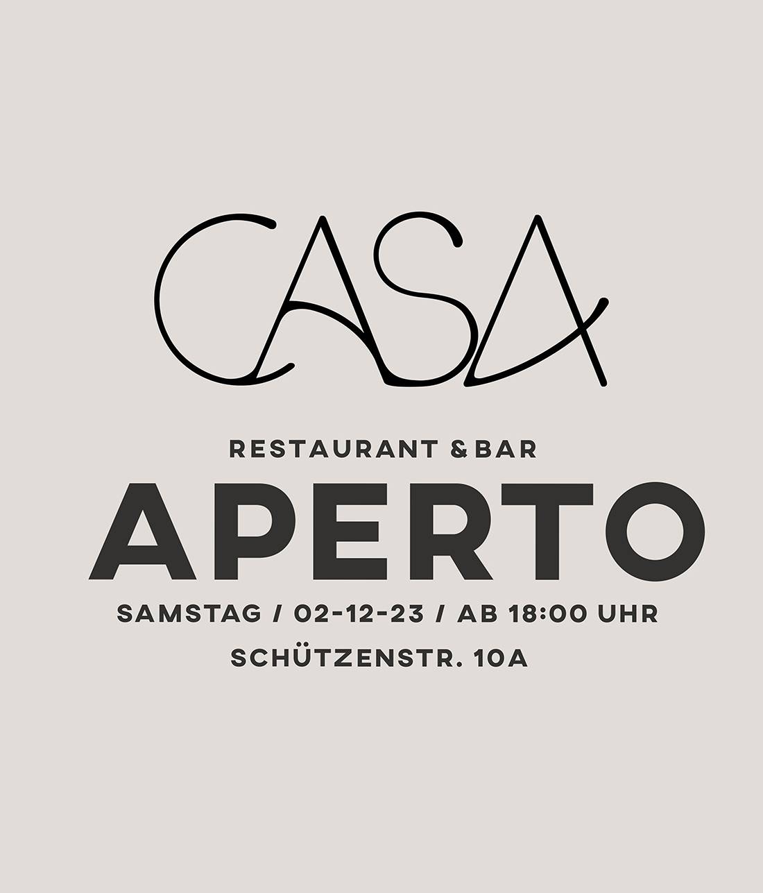 Schriftzug mit Ankündigung: „CASA Restaurant & Bar APERTO Samstag, 02-12-23, ab 18:00 Uhr, Schützenstr. 10A“.