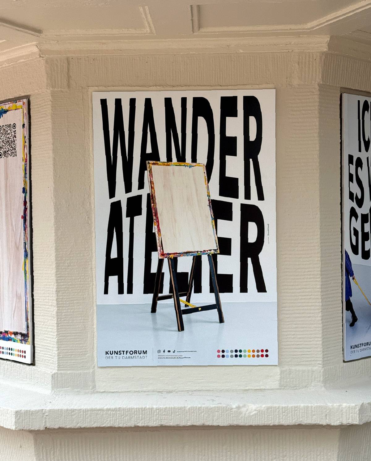 Plakat mit großem Schriftzug "WANDER ATELIER", davor eine Staffelei mit leerer Leinwand; unten steht "KUNSTFORUM DER TU DARMSTADT".
